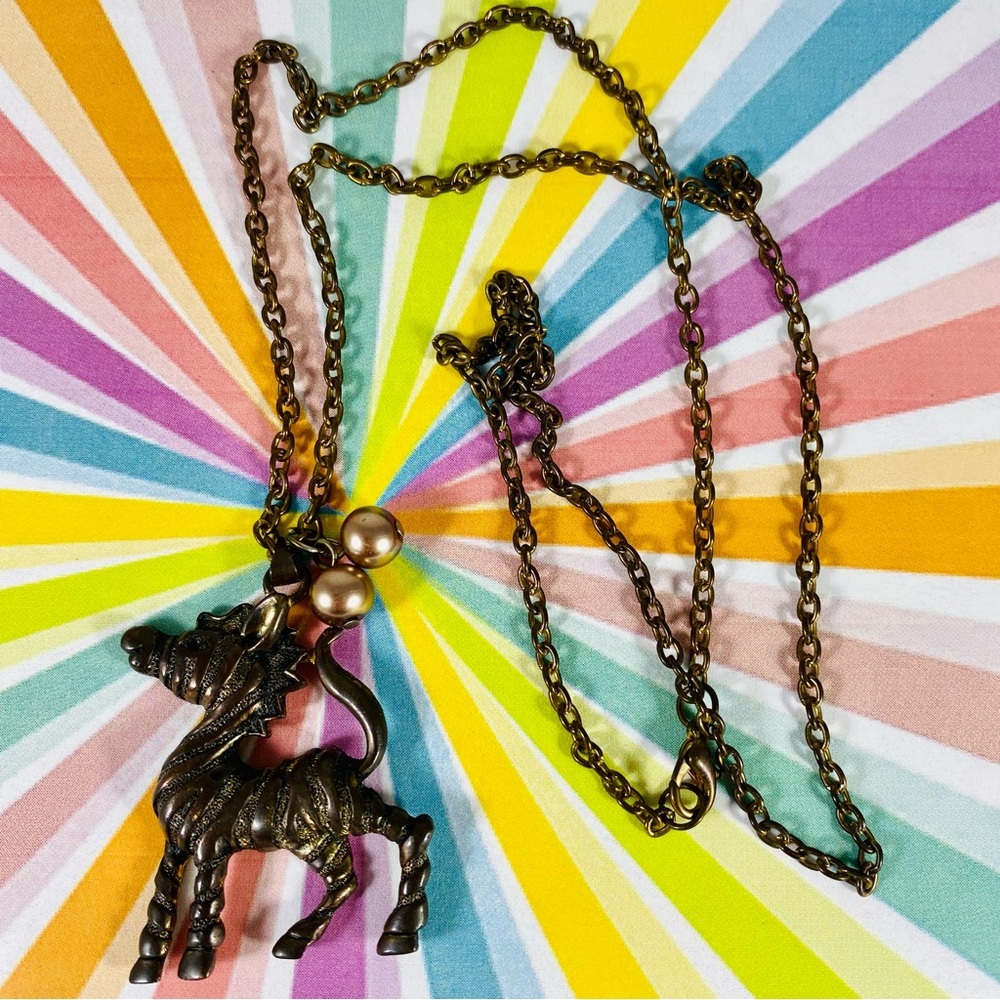 Adorable vintage zebra pendant necklace in antique bronze.